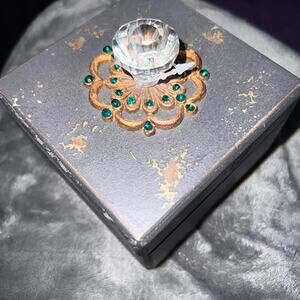 Brown and gold distressed trinket box with rhinestone lid